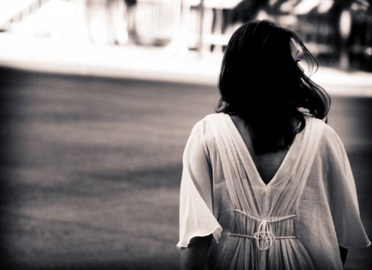 woman walking away