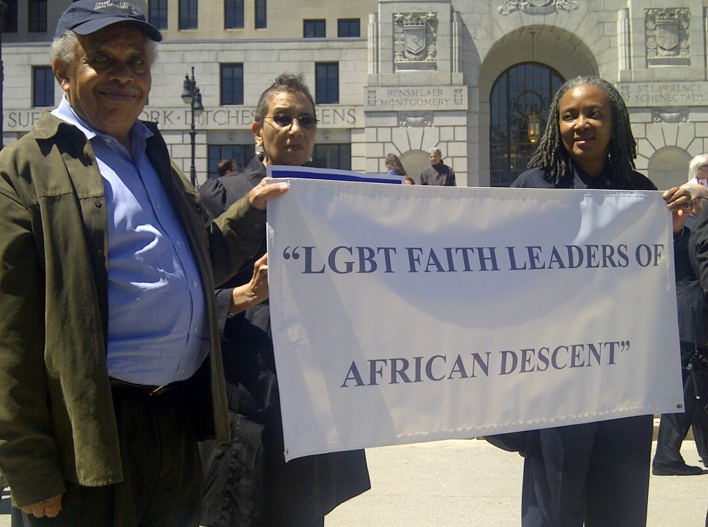 Dr. Perry (center) with LGBTFLoAD members